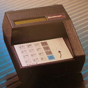 Check Reader--reads bank checks - Check Reader--reads bank checks reliably. Keypad for amount of check and LCD screen for verification